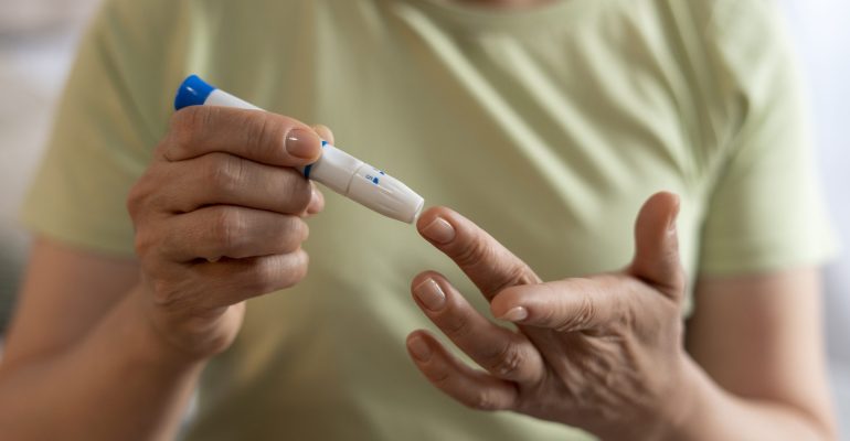 front-view-diabetic-woman-checking-her-glucose-level